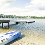 Lake Claire boat dock with kayak in the foreground.